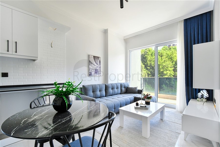 Gemütliche 1+1 Wohnung in einer Anlage umgeben von Nadelwäldern in Avsallar