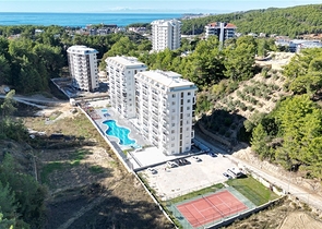 Gemütliche 1+1 Wohnung in einer Anlage umgeben von Nadelwäldern in Avsallar