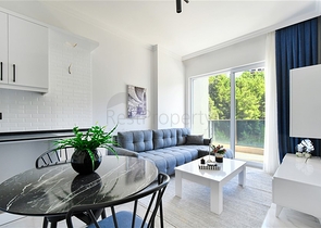 Gemütliche 1+1 Wohnung in einer Anlage umgeben von Nadelwäldern in Avsallar