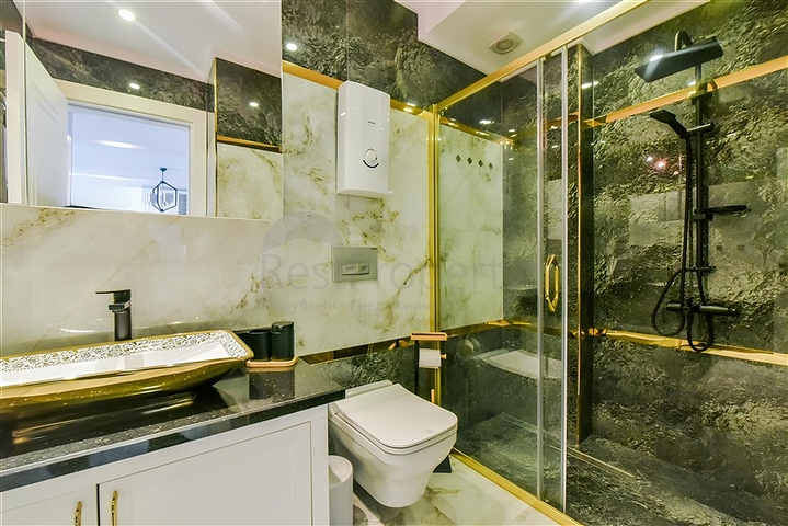 Edle 1+1 Wohnung mit Meerblick in einer hochwertigen Anlage im Stadtteil Kargicak