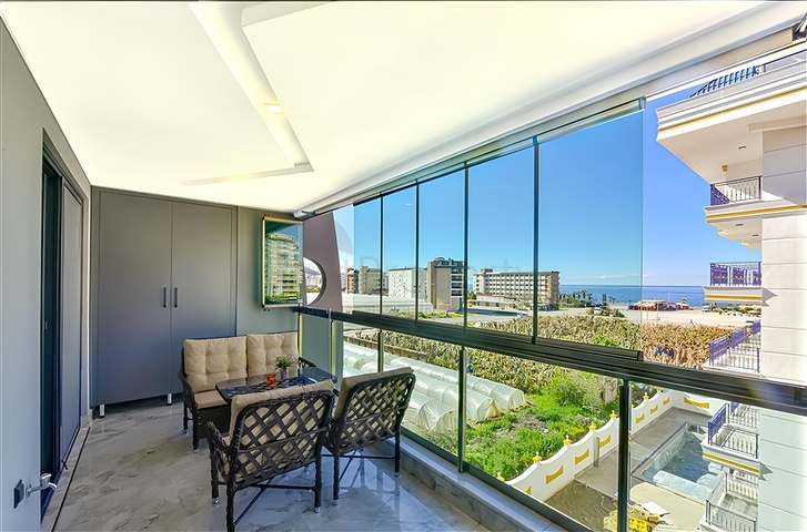 Edle 1+1 Wohnung mit Meerblick in einer hochwertigen Anlage im Stadtteil Kargicak