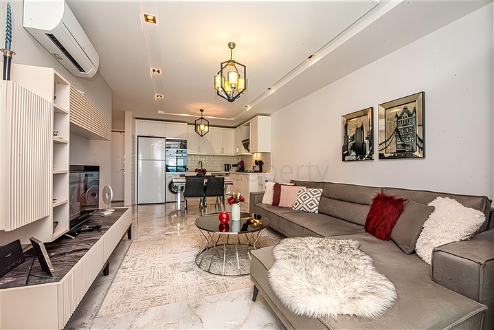 Edle 1+1 Wohnung mit Meerblick in einer hochwertigen Anlage im Stadtteil Kargicak