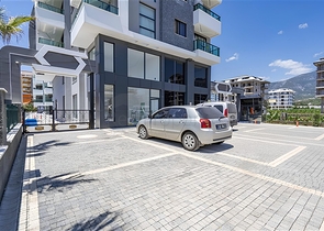 Edle 1+1 Wohnung mit Meerblick in einer hochwertigen Anlage im Stadtteil Kargicak