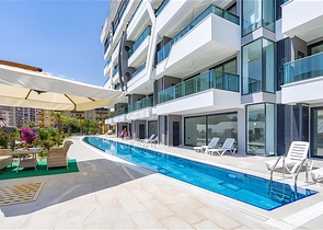 Edle 1+1 Wohnung mit Meerblick in einer hochwertigen Anlage im Stadtteil Kargicak