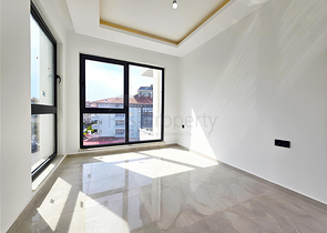 Moderne 1+1-Wohnung in einer neuen Wohnanlage im Zentrum von Oba