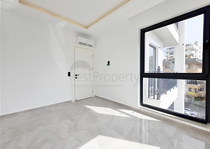 Moderne 1+1-Wohnung in einer neuen Wohnanlage im Zentrum von Oba