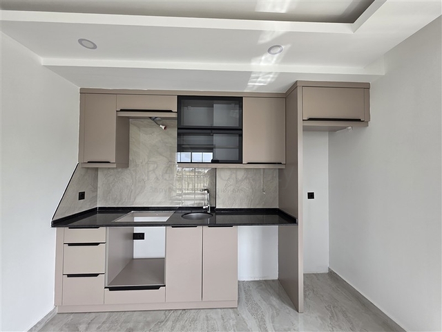 Gemütliche 1+1 Wohnung in einem neuen Komplex mit Meerblick