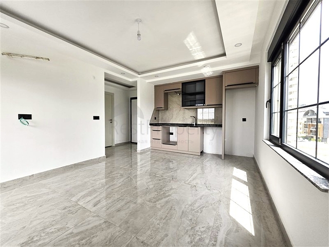 Gemütliche 1+1 Wohnung in einem neuen Komplex mit Meerblick