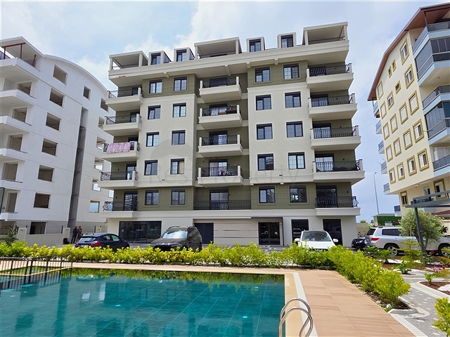 Gemütliche 1+1 Wohnung in einem neuen Komplex mit Meerblick