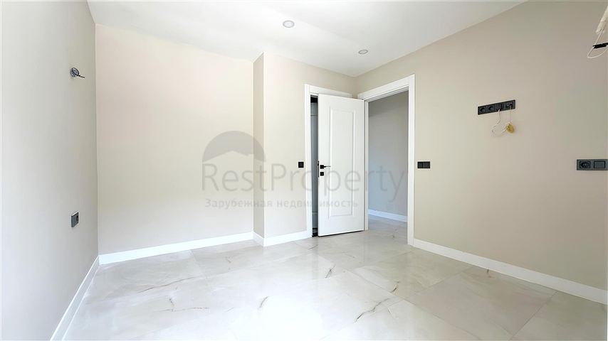 Moderne 2+1 Maisonette mit Garten in einem Komplex am Meer 