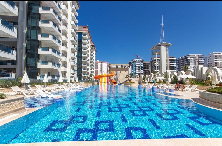 Moderne Wohnung am Meer in einer entwickelten Gegend von Alanya