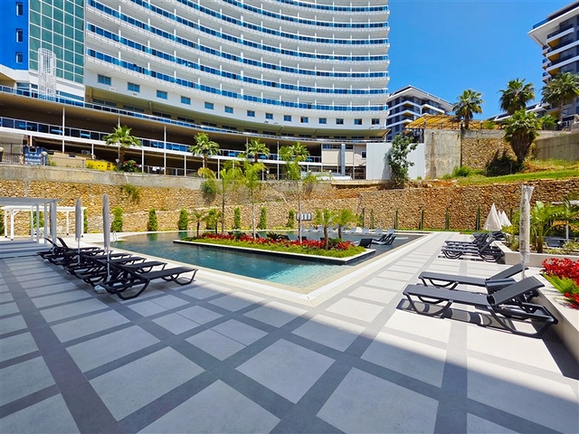 Moderne 1+1-Wohnung in der Nähe des Meeres im Stadtteil Tosmur