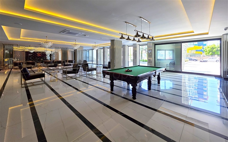 Moderne 1+1-Wohnung in der Nähe des Meeres im Stadtteil Tosmur