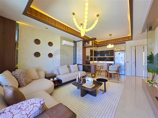 Modernes 1+1 Apartment in einem prestigeträchtigen Komplex am Meer in Turkler