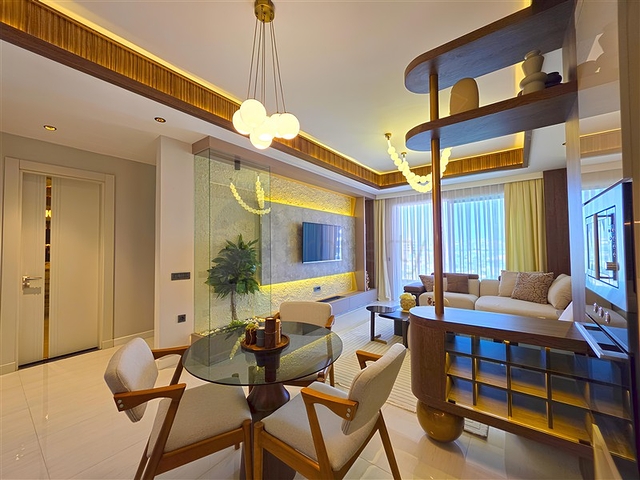 Modernes 1+1 Apartment in einem prestigeträchtigen Komplex am Meer in Turkler