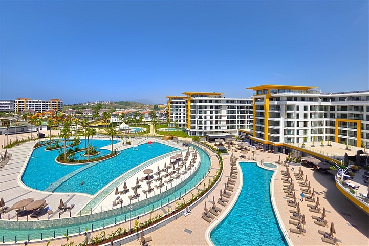 Modernes 1+1 Apartment in einem prestigeträchtigen Komplex am Meer in Turkler