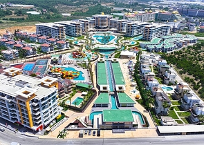 Modernes 1+1 Apartment in einem prestigeträchtigen Komplex am Meer in Turkler