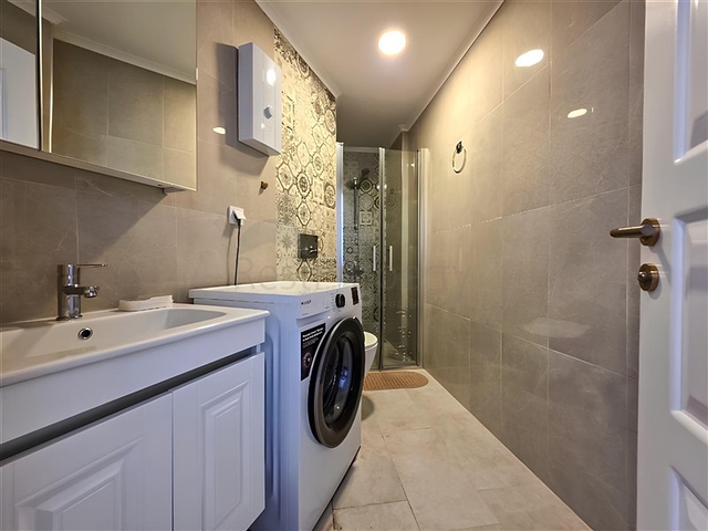 Mieten Sie eine gemütliche 1+1 Wohnung mit reicher Infrastruktur im Herzen von Mahmutlar Mieten Sie eine gemütliche 1+1 Wohnung mit reicher Infrastruktur im Herzen von Mahmutlar