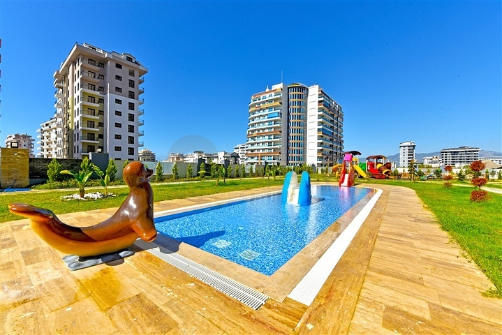 Mieten Sie eine gemütliche 1+1 Wohnung mit reicher Infrastruktur im Herzen von Mahmutlar Mieten Sie eine gemütliche 1+1 Wohnung mit reicher Infrastruktur im Herzen von Mahmutlar