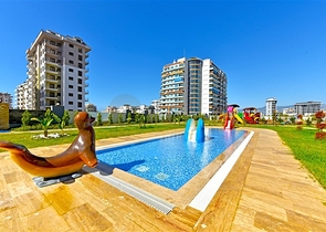 Mieten Sie eine gemütliche 1+1 Wohnung mit reicher Infrastruktur im Herzen von Mahmutlar Mieten Sie eine gemütliche 1+1 Wohnung mit reicher Infrastruktur im Herzen von Mahmutlar