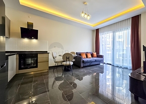 Mieten Sie eine gemütliche 1+1 Wohnung mit reicher Infrastruktur im Herzen von Mahmutlar Mieten Sie eine gemütliche 1+1 Wohnung mit reicher Infrastruktur im Herzen von Mahmutlar