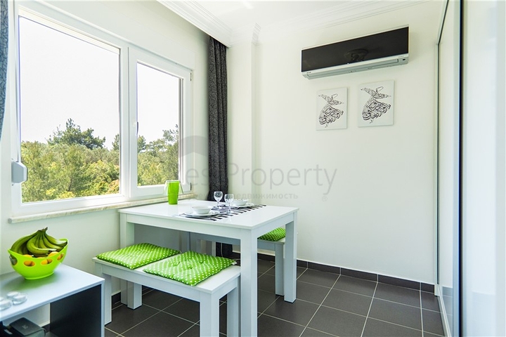 Gemütliche 2+1 Wohnung in einem Haus mit Pool und Grünfläche