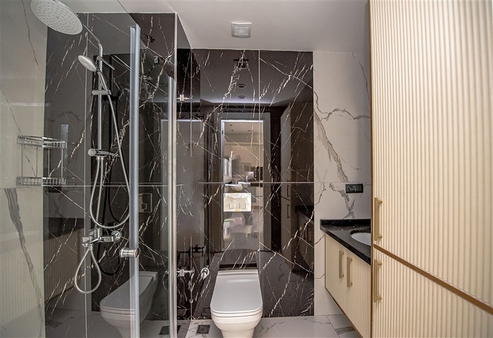 Komfort und Stil im Zentrum von Oba — eine moderne Wohnung mit reicher Infrastruktur