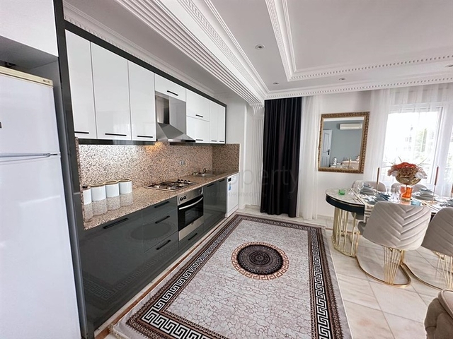 Gemütliche Wohnung in einem bewohnten Komplex im Herzen des Bezirks Oba