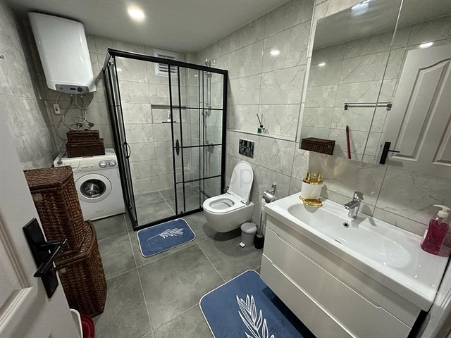 Gemütliche Wohnung in einem bewohnten Komplex im Herzen des Bezirks Oba