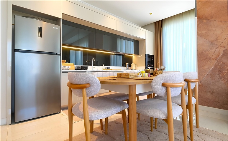 Luxuriöse 3+1-Wohnung mit Garten in einem Luxus-Komplex am Meer