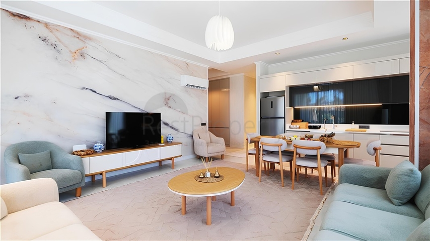 Luxuriöse 3+1-Wohnung mit Garten in einem Luxus-Komplex am Meer