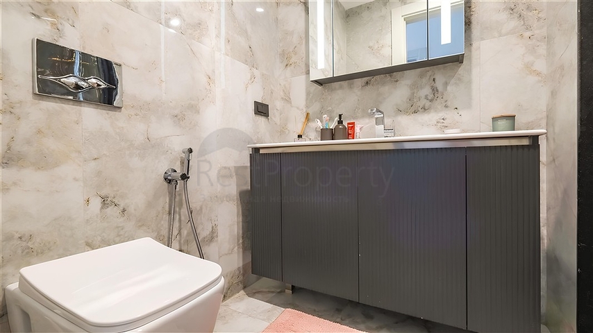 Luxuriöse 3+1-Wohnung mit Garten in einem Luxus-Komplex am Meer