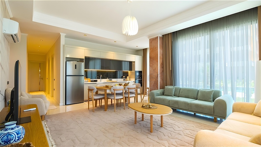 Luxuriöse 3+1-Wohnung mit Garten in einem Luxus-Komplex am Meer