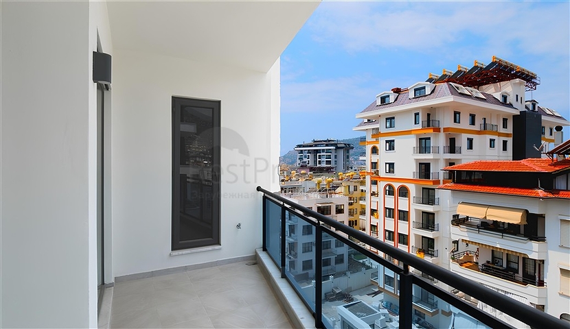 Geräumige 2+1-Wohnung in einem neuen Komplex mit Meerblick im Zentrum von Alanya