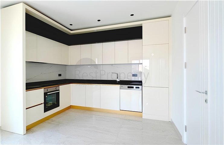 Geräumige 2+1-Wohnung in einem neuen Komplex mit Meerblick im Zentrum von Alanya