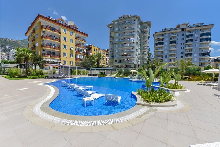 Geräumige 2+1-Wohnung in einem neuen Komplex mit Meerblick im Zentrum von Alanya