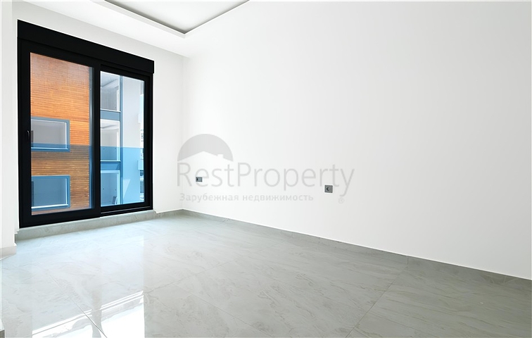 Geräumige 2+1-Wohnung in einem neuen Komplex mit Meerblick im Zentrum von Alanya