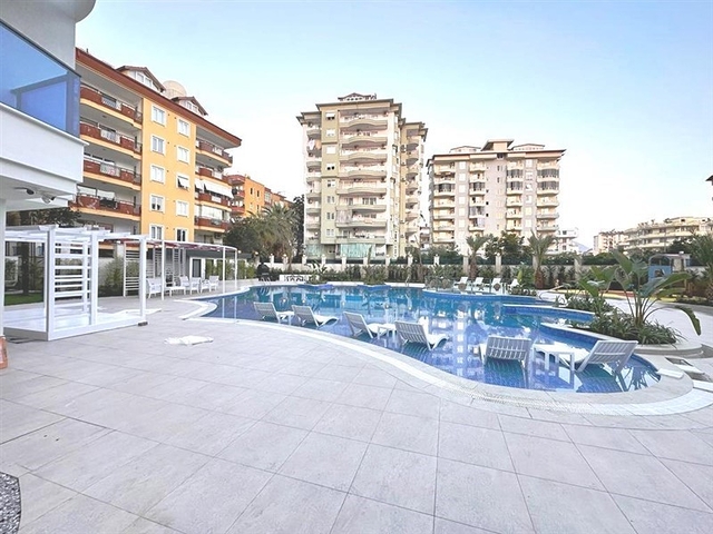 Geräumige 2+1-Wohnung in einem neuen Komplex mit Meerblick im Zentrum von Alanya