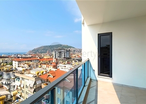 Geräumige 5+1-Wohnung mit Meerblick im Zentrum von Alanya