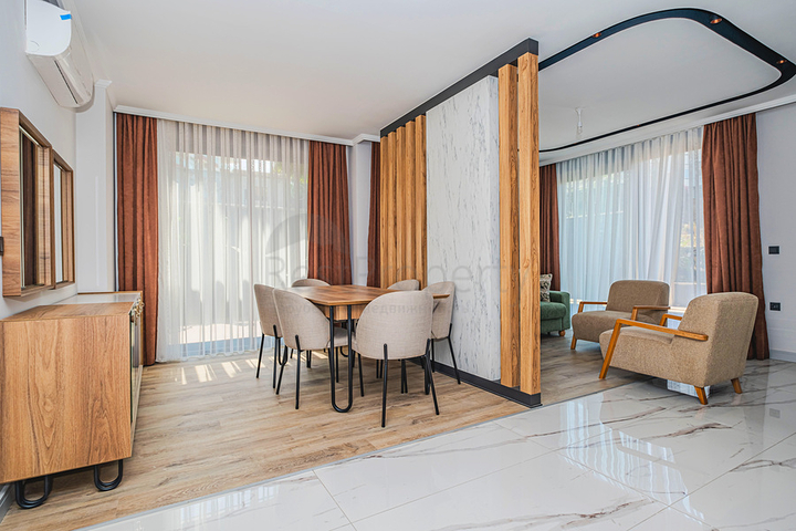 Moderne Wohnung mit Garten am Meer in einer malerischen Gegend