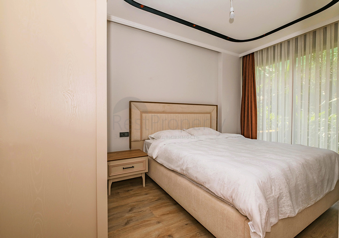 Moderne Wohnung mit Garten am Meer in einer malerischen Gegend