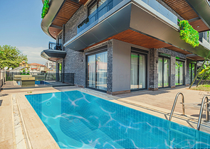 Moderne Wohnung mit Garten am Meer in einer malerischen Gegend