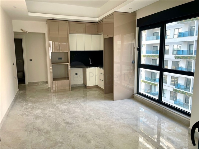 Moderne 1+1-Wohnung in einem neuen Komplex mit Pool und Spa-Bereich in Mahmutlar