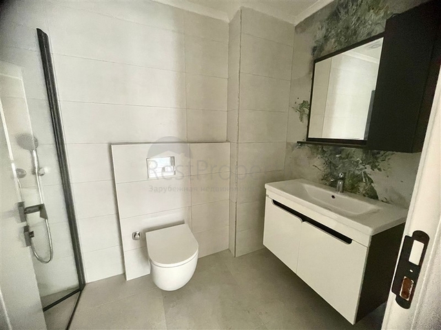 Moderne 1+1-Wohnung in einem neuen Komplex mit Pool und Spa-Bereich in Mahmutlar