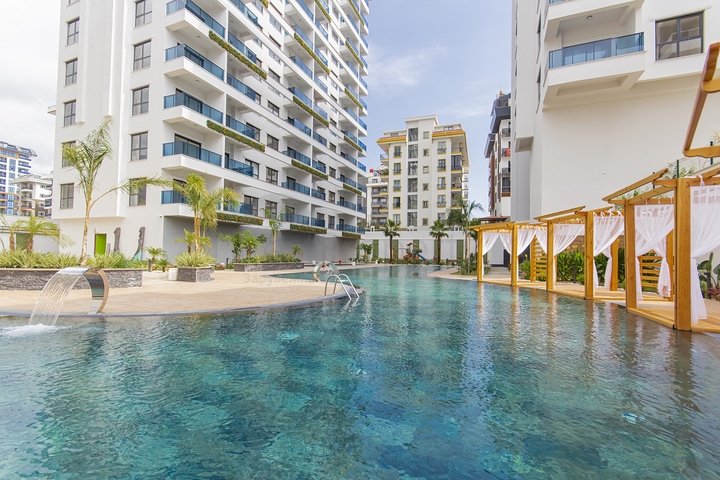 Moderne 1+1-Wohnung in einem neuen Komplex mit Pool und Spa-Bereich in Mahmutlar