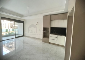 Moderne 1+1-Wohnung in einem neuen Komplex mit Pool und Spa-Bereich in Mahmutlar